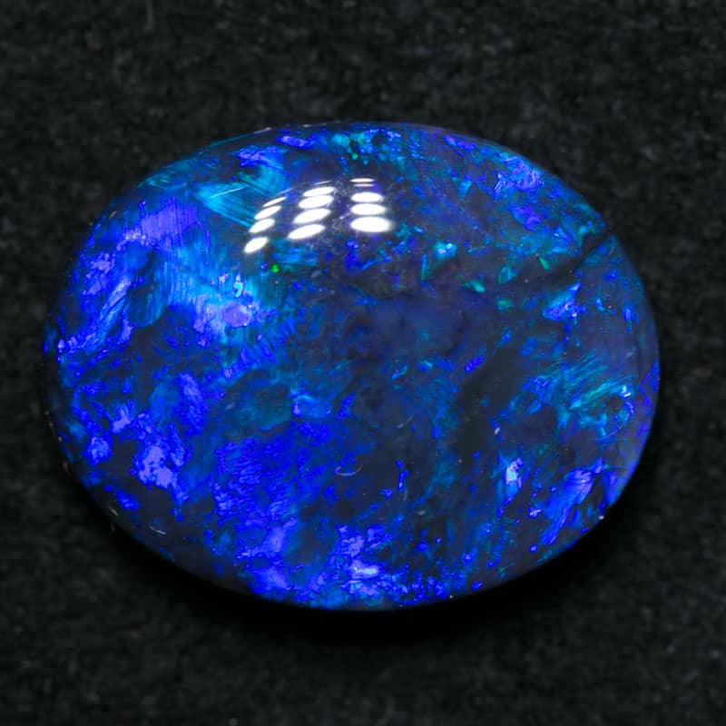 3.22 ct black opal 12x9.5x4.5mm