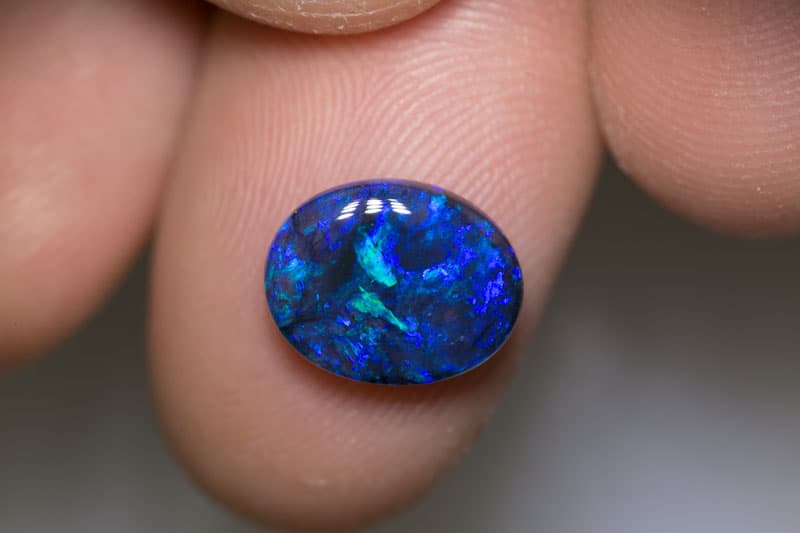 3.22 ct black opal 12x9.5x4.5mm