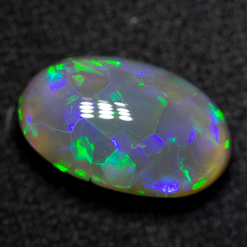 3.28 ct dark crystal opal 12x7x5mm