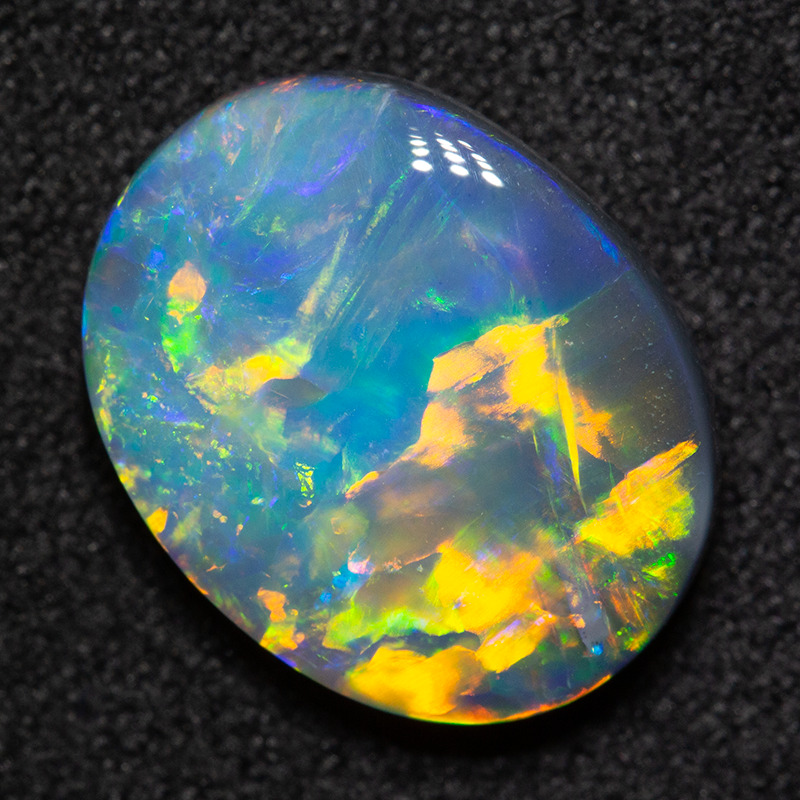 3.31 ct black opal 12.7x10.1x4.1mm