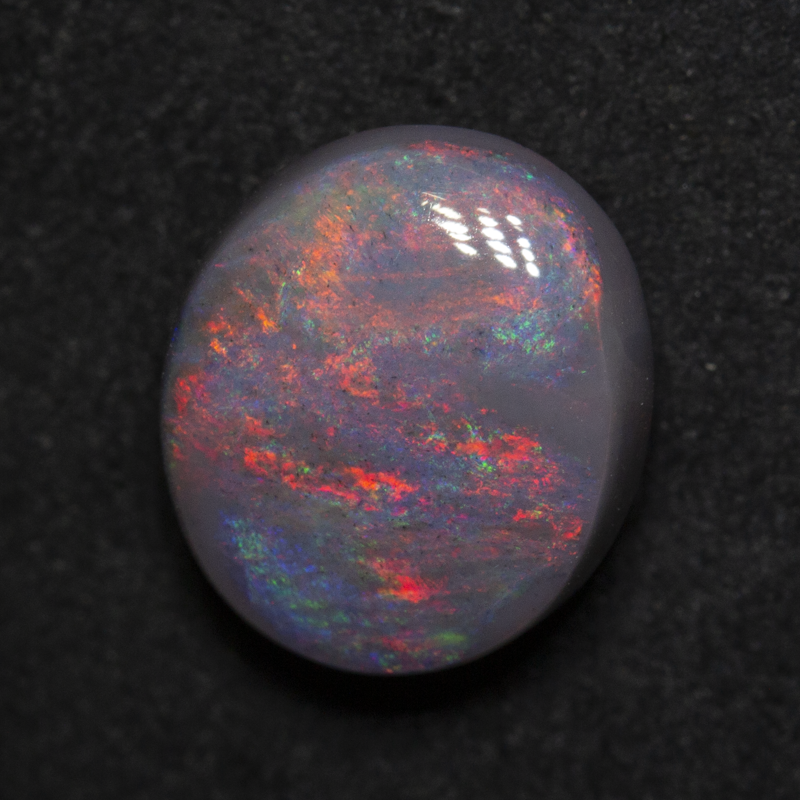 3.32 ct dark opal 10.8x9.3x5.5mm