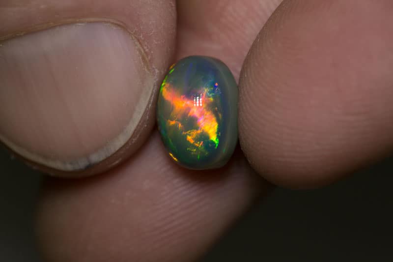 6.86 ct gem black opal 13.5x10x8mm