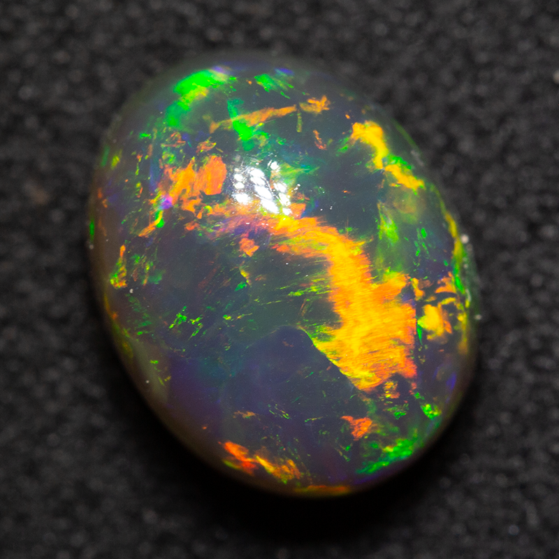 3.36 ct black opal 10.1x7.9x6.5mm