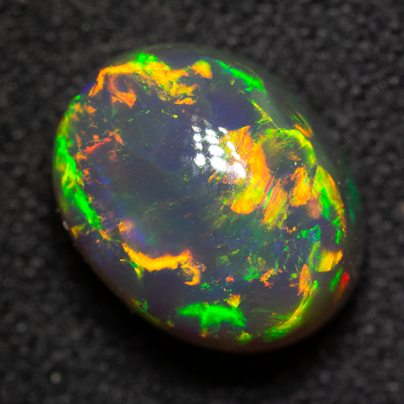 3.36 ct black opal 10.1x7.9x6.5mm