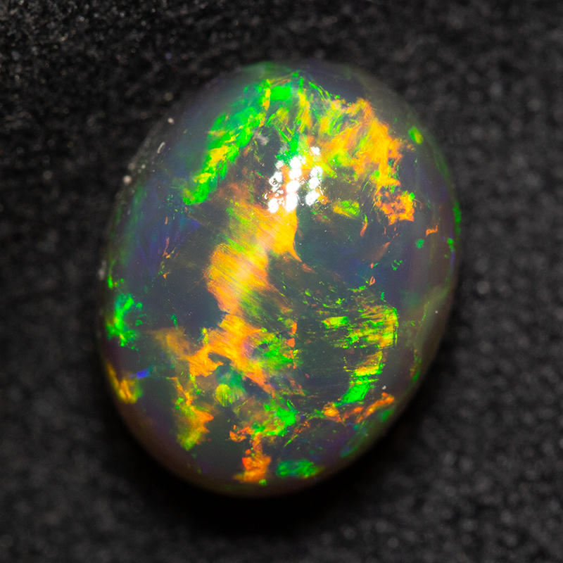 3.36 ct black opal 10.1x7.9x6.5mm