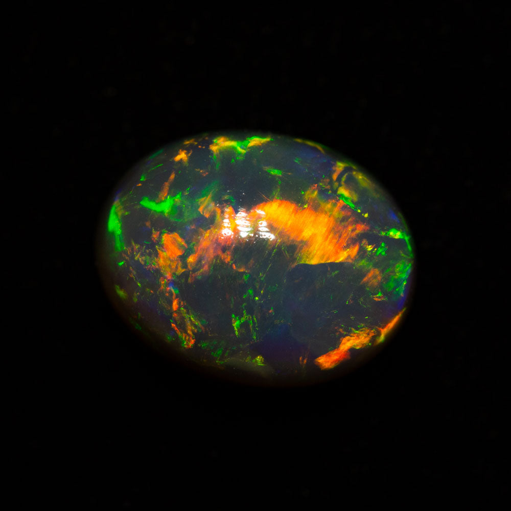 3.36 ct black opal 10.1x7.9x6.5mm