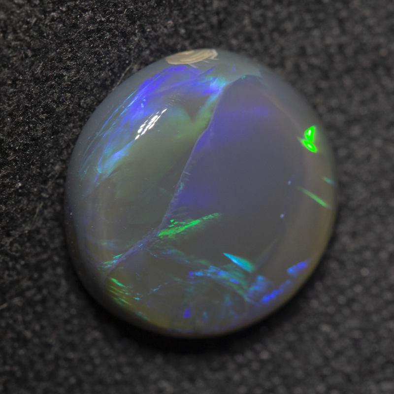 3.41 ct black opal 11x10.9x4.4mm