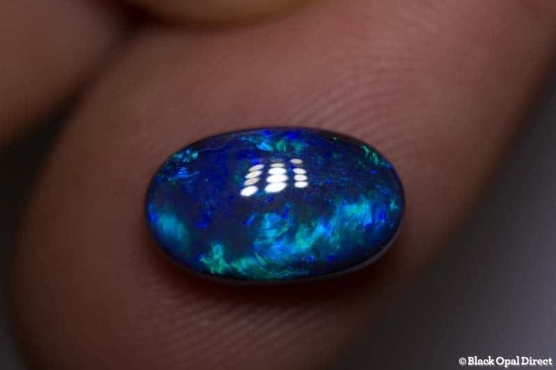 3.42 ct black opal 12x7.5x5mm