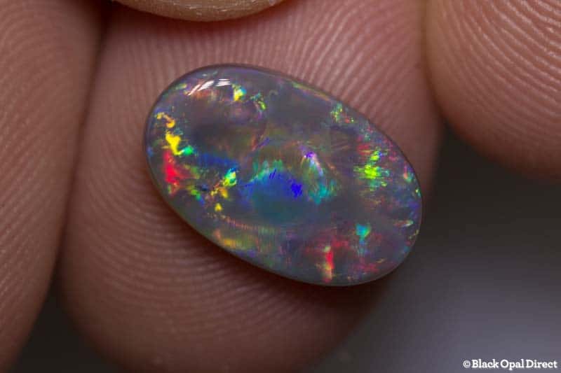 3.46 ct semi black opal 15x9.5x3mm