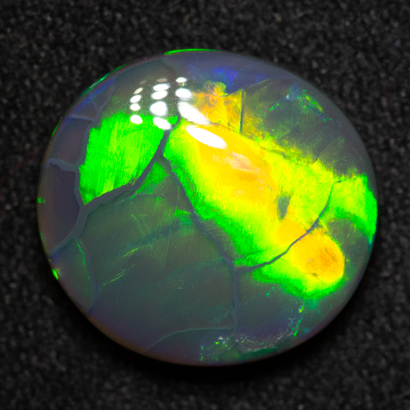 3.48 ct black opal 12x11.2x4.1mm