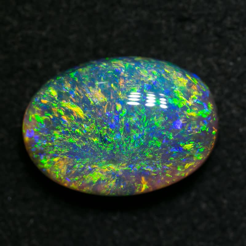 3.50 ct dark crystal opal 12x9x5mm