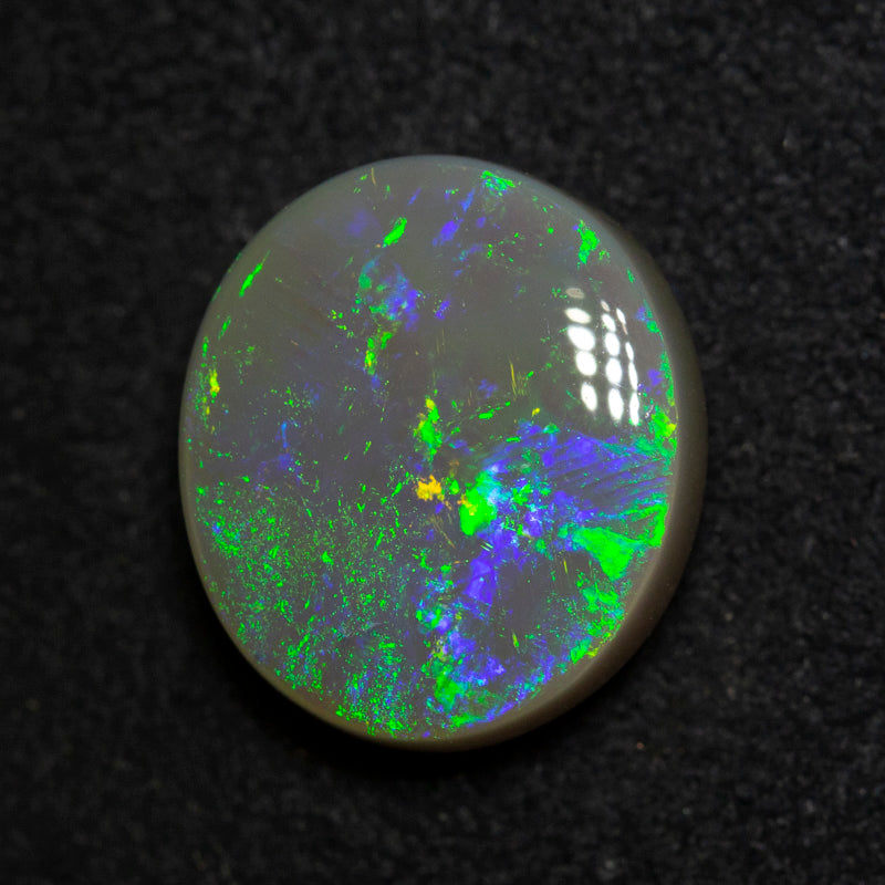 3.55 ct dark opal 11.1x9.9x5mm