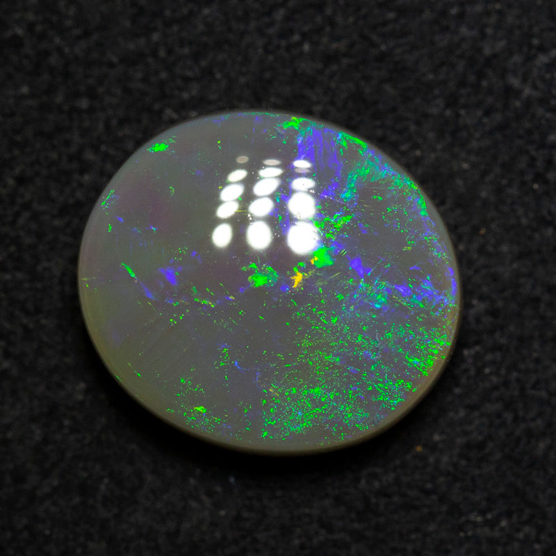 3.55 ct dark opal 11.1x9.9x5mm