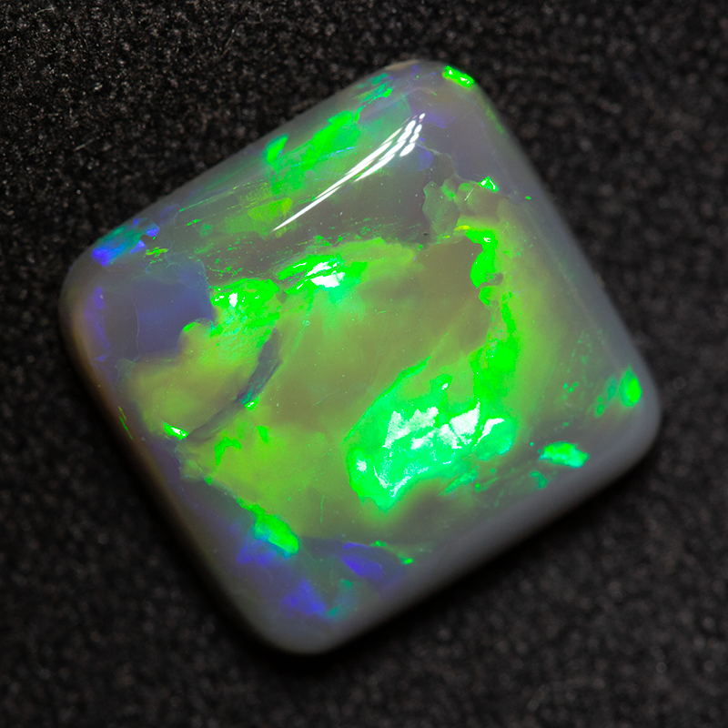3.56 ct dark opal 11.1x10.8x3.6mm