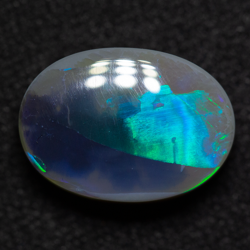 3.56 ct dark opal 11.8x8.5x5mm