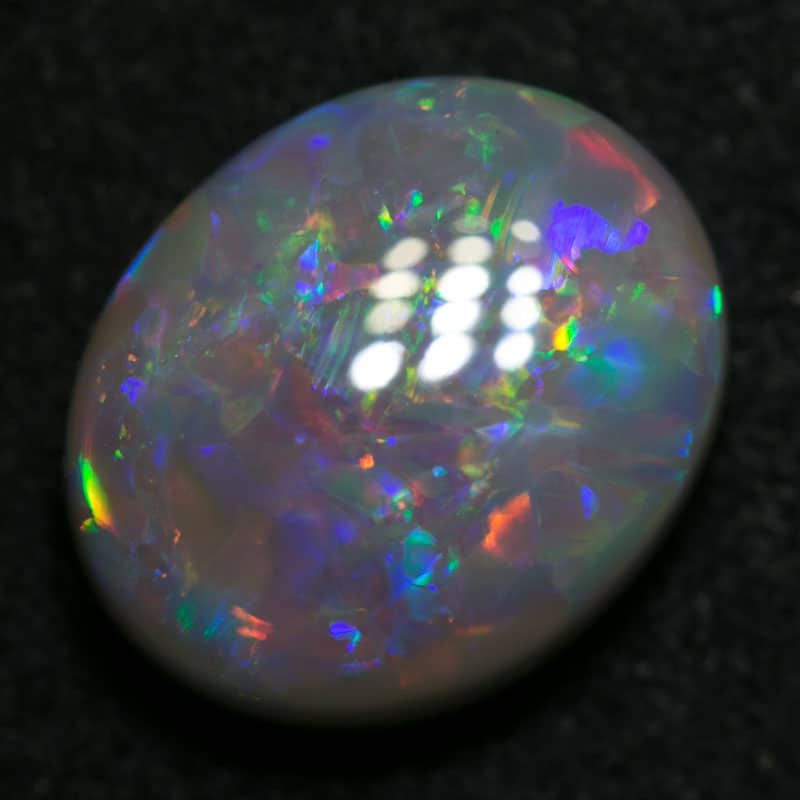 3.68 ct dark opal 12x10x4.5mm