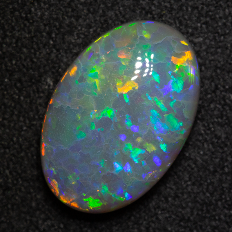 3.76 ct dark opal 13.6x9.3x4.8mm