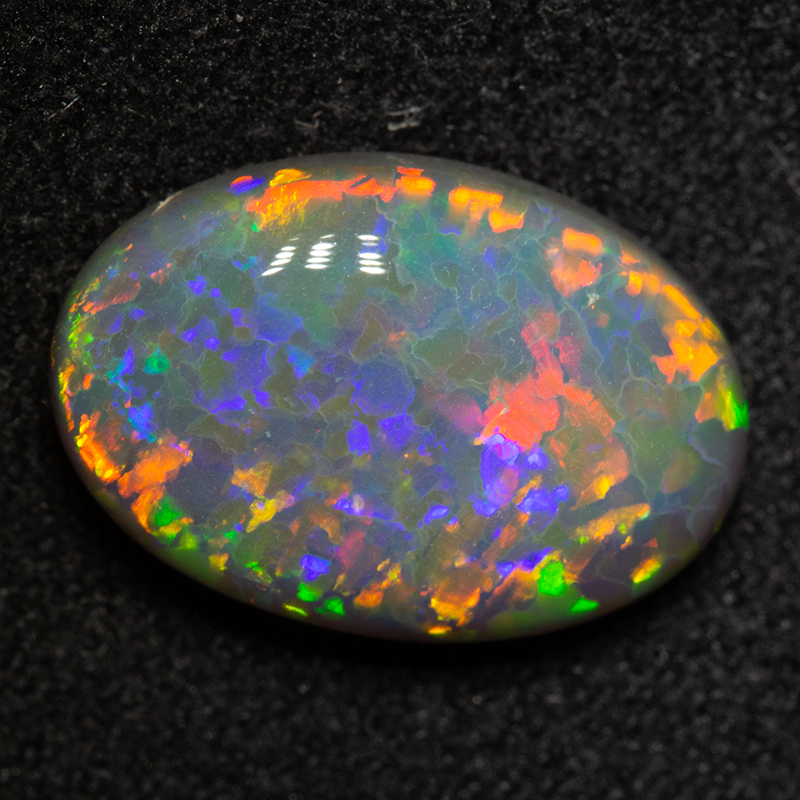 3.76 ct dark opal 13.6x9.3x4.8mm