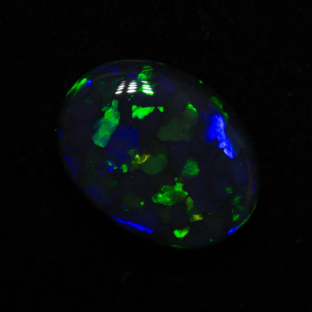 3.84 ct black opal 12.7x9.5x4.9mm