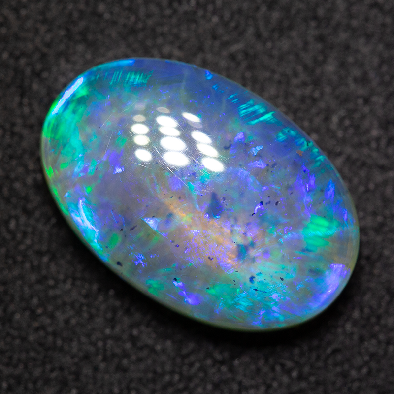 3.87 ct dark opal 13.6x8.9x4.7mm