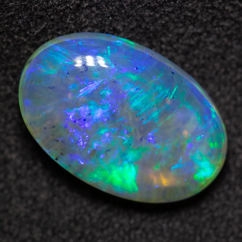 3.87 ct dark opal 13.6x8.9x4.7mm