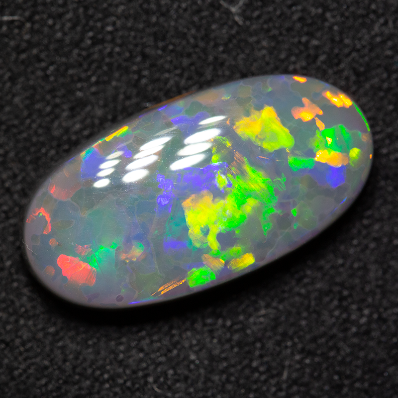 3.89 ct dark opal 16x8.3x4.4mm