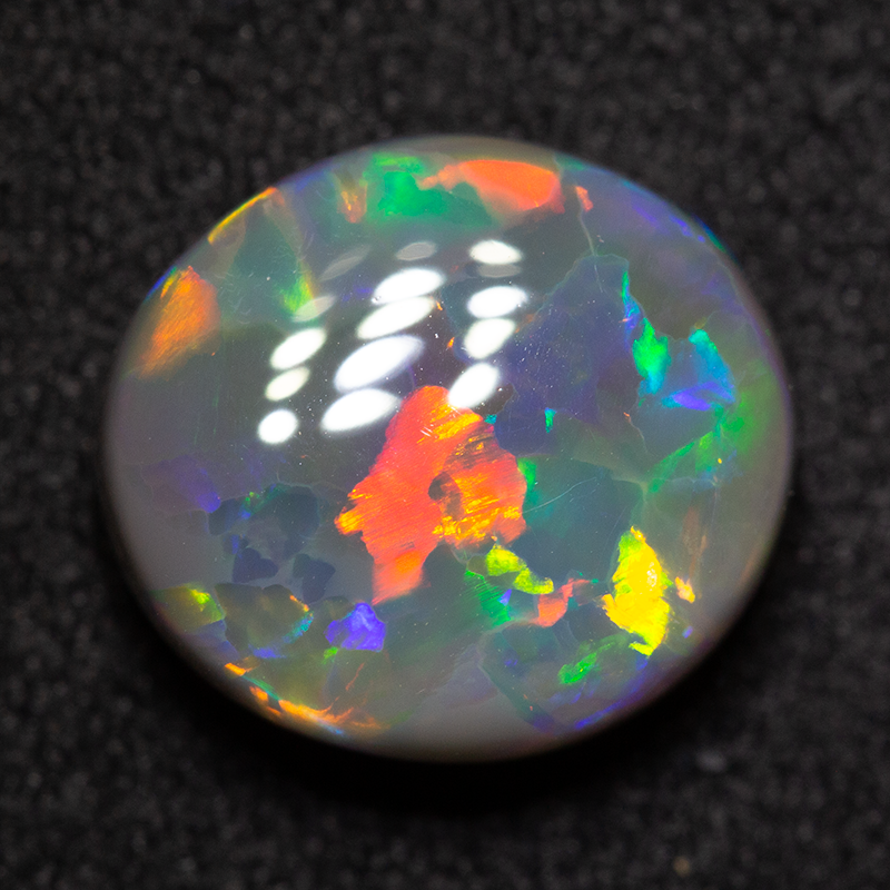 3.92 ct gem black opal 11.2x10.1x5.5mm