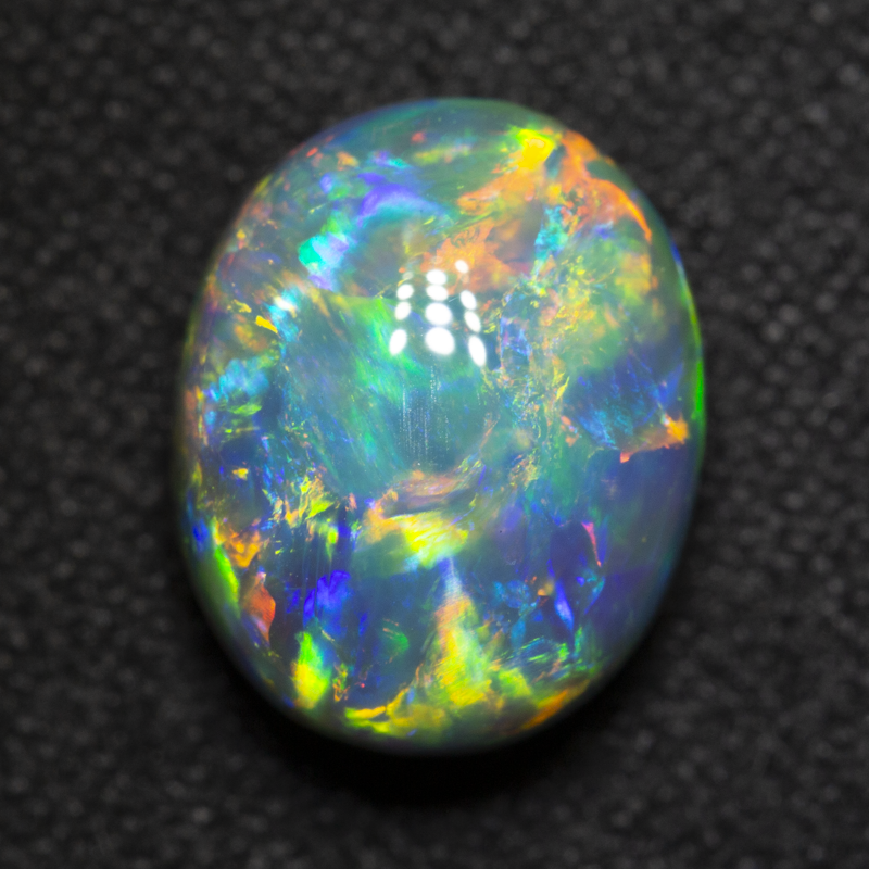 3.92 ct gem black opal 10.8x8.7x6.1mm