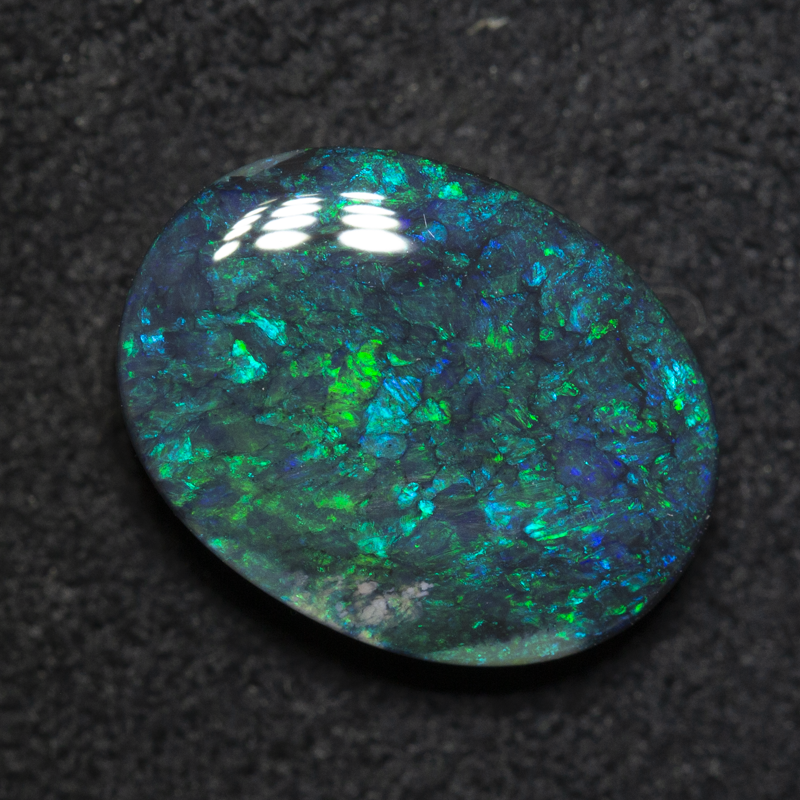 3.98 ct double-sided black opal 12.8x9.7x4.4mm