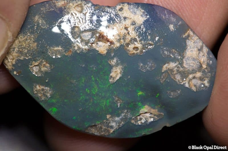 31 carat roughly rubbed opal piece 38mm