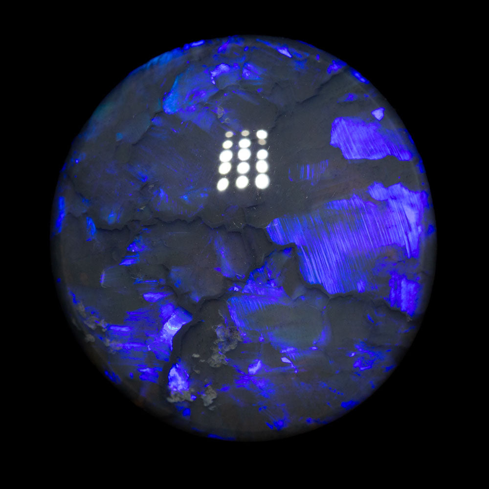 32.53 ct black opal 25.1x23.9x8.5mm