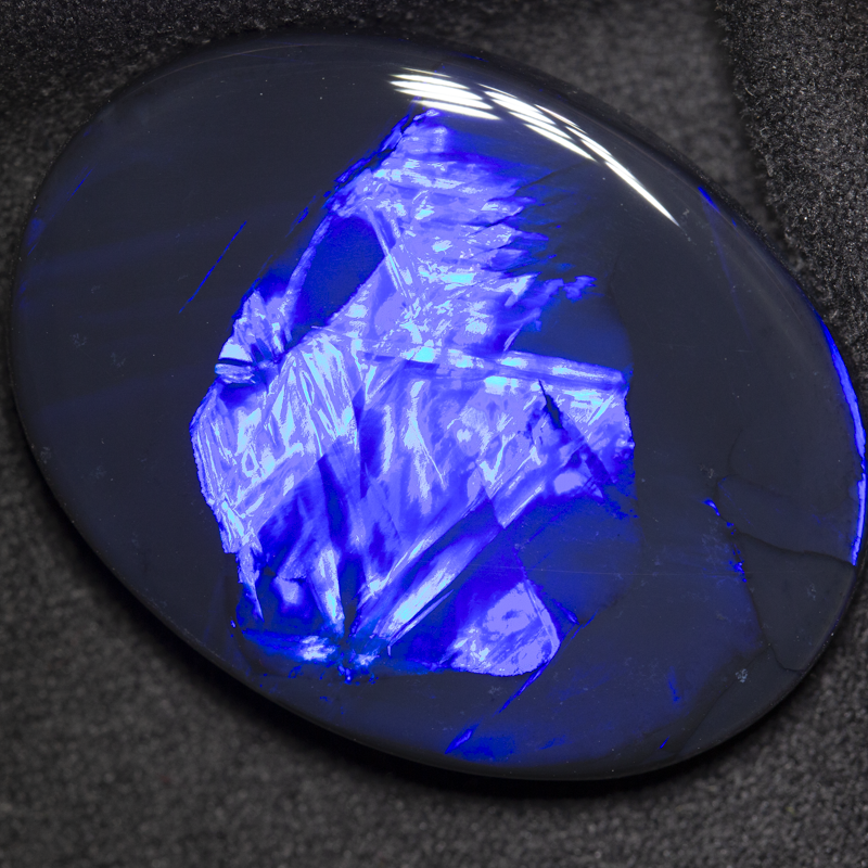 34.50 ct black opal 32x23.2x6.9mm
