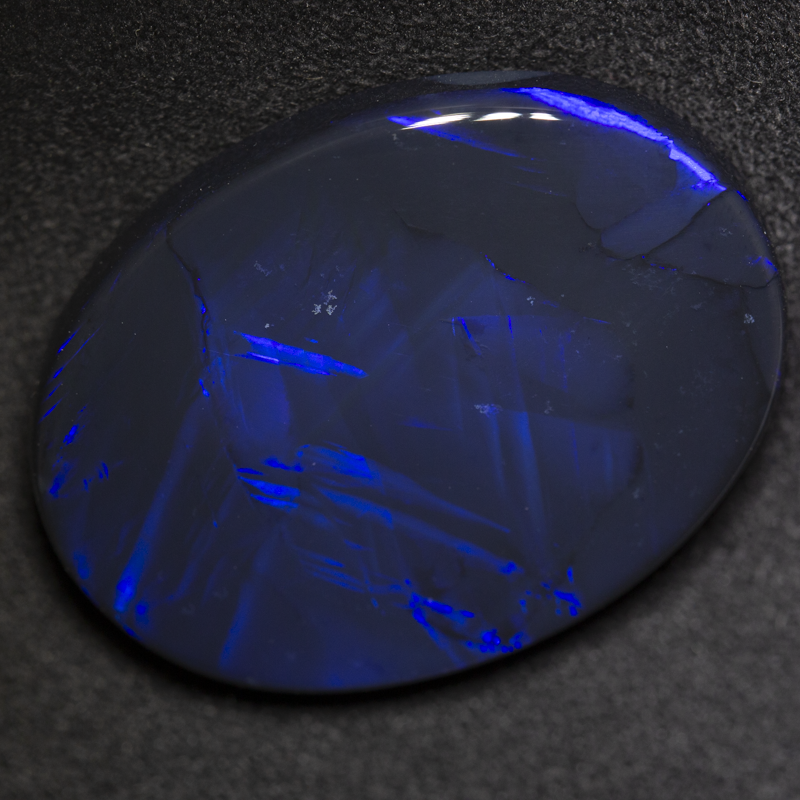 34.50 ct black opal 32x23.2x6.9mm