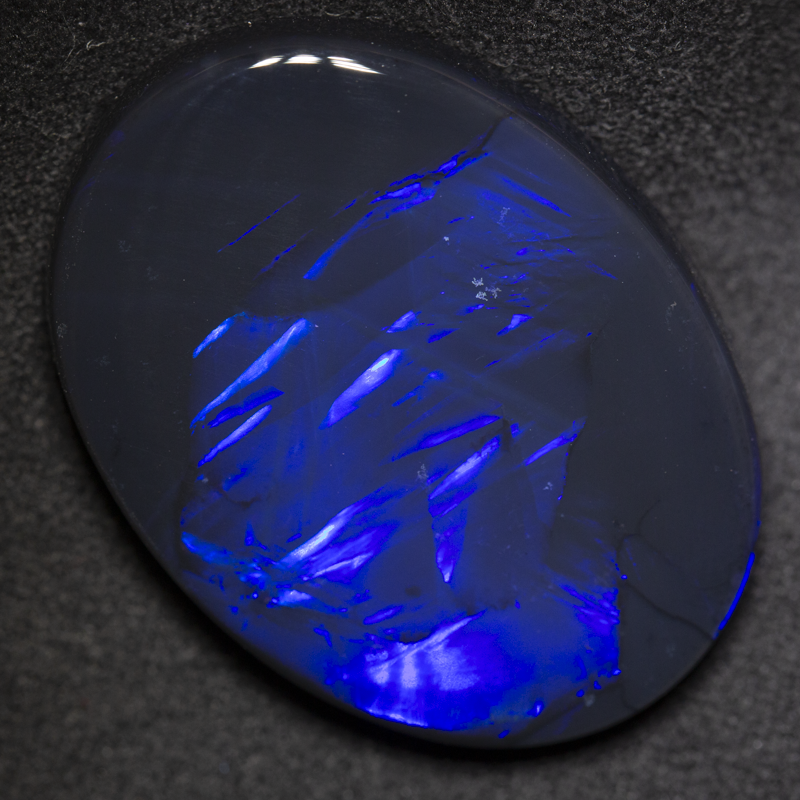 34.50 ct black opal 32x23.2x6.9mm