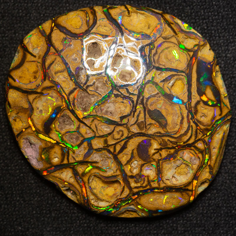 34.63 ct boulder opal 32x28x6.2mm