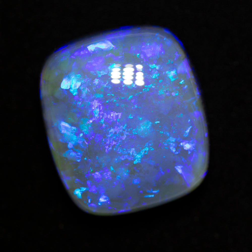 35.23 ct black opal 21.5x18.9x11.9mm