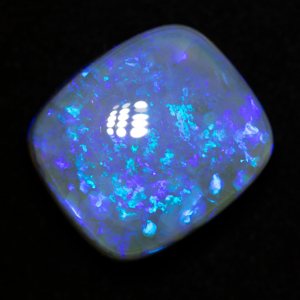 35.23 ct black opal 21.5x18.9x11.9mm