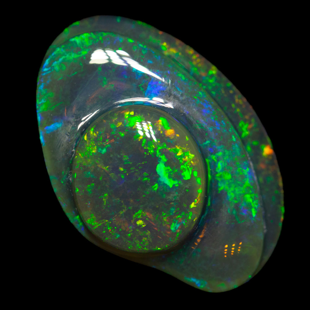 37.07 ct black crystal opal carving 33x22.1x10.5mm