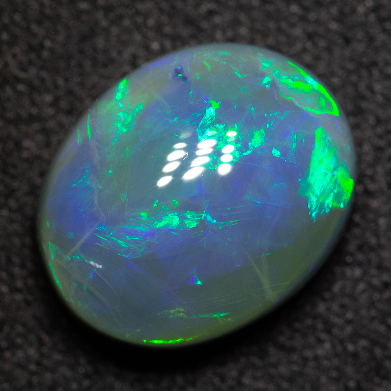 4.09 ct black opal 11.4x9.3x6mm