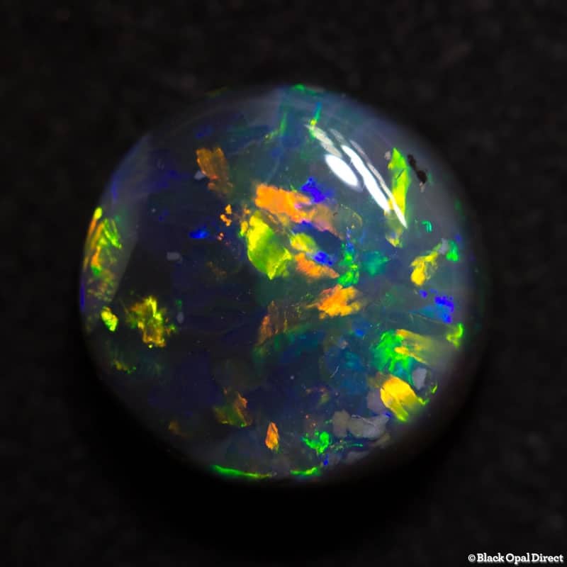 4.12 ct semi black opal 10mm round x6mm