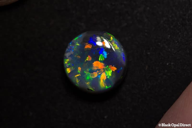 4.12 ct semi black opal 10mm round x6mm