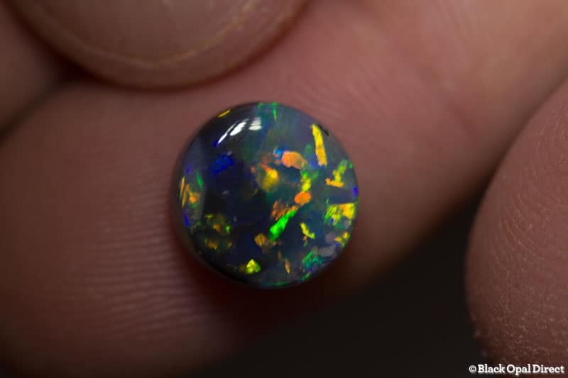 4.12 ct semi black opal 10mm round x6mm