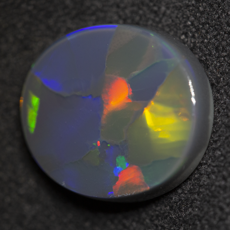 4.15 ct black opal 13.4x11.6x3.7mm