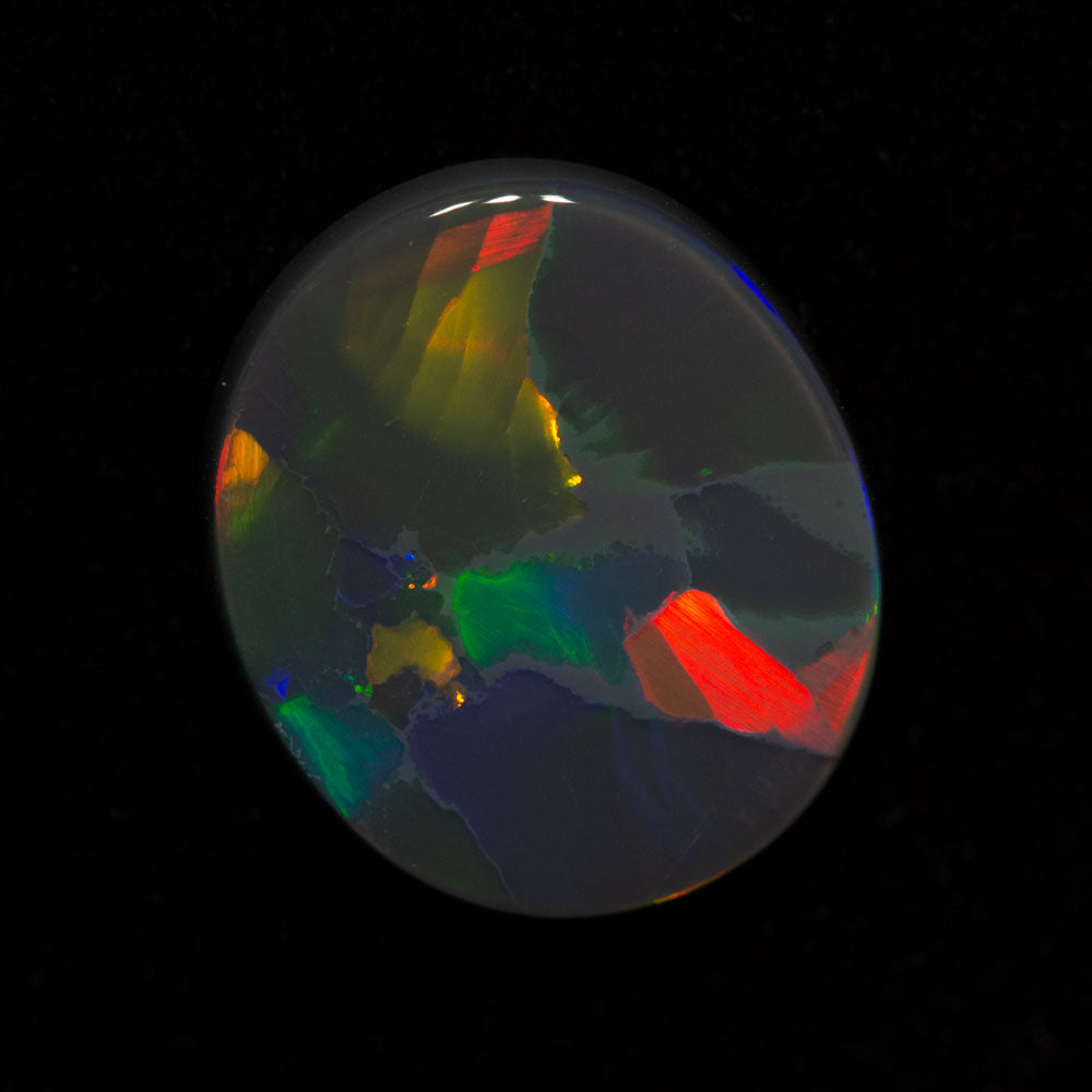 4.15 ct black opal 13.4x11.6x3.7mm