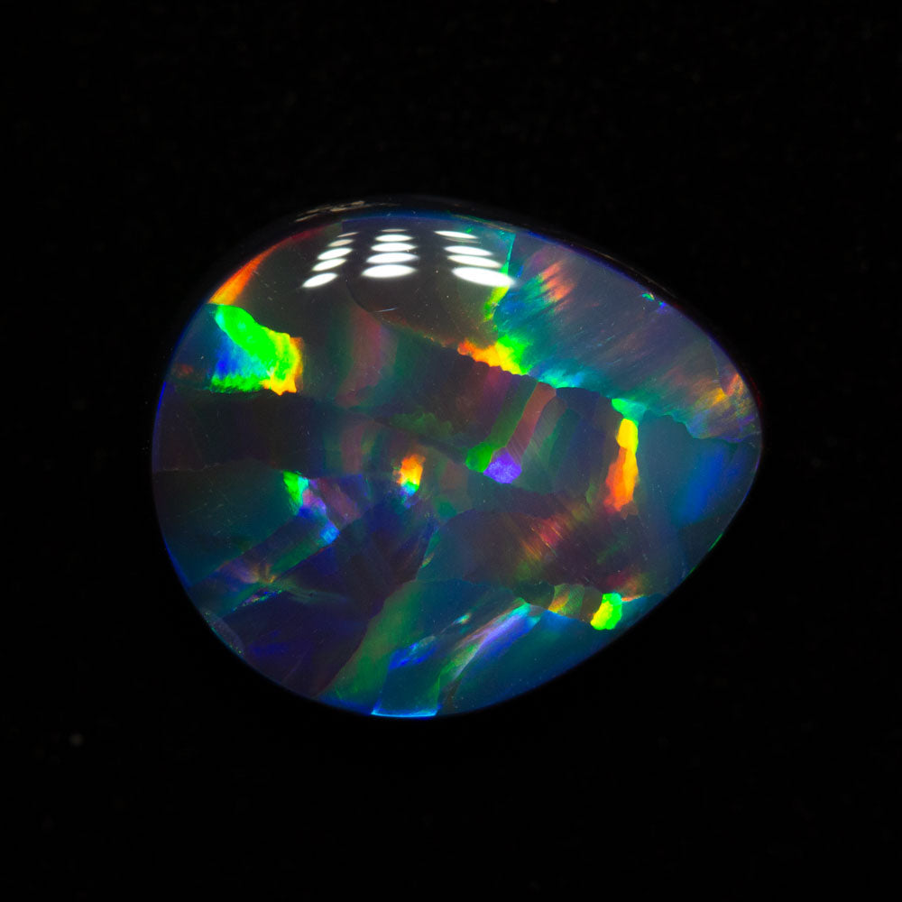 4.16 ct gem black opal 12.6x10.6x4.8mm