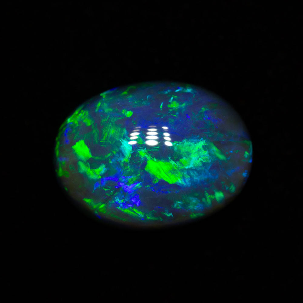4.20 ct gem black opal 11.8x8.8x6.4mm