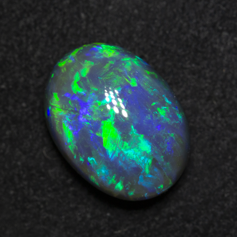 4.20 ct gem black opal 11.8x8.8x6.4mm