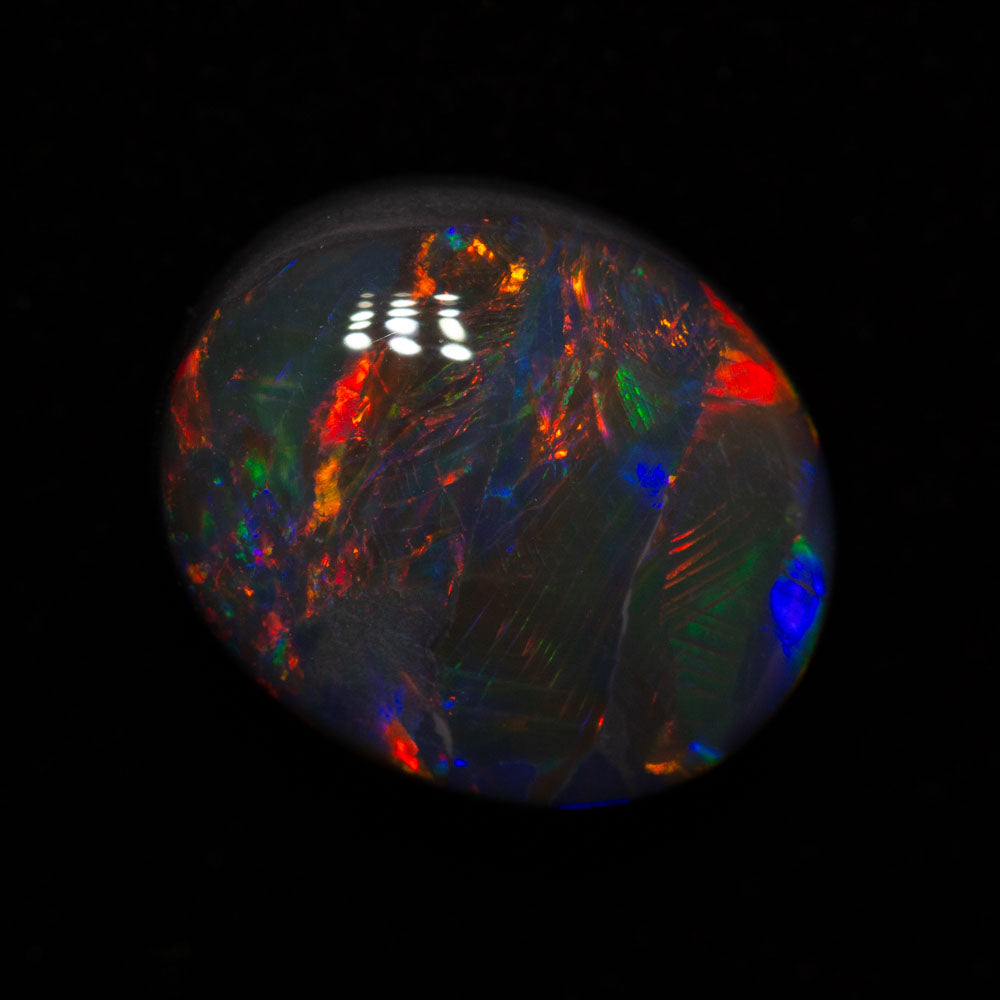 4.39 ct gem black opal 12x10x6mm