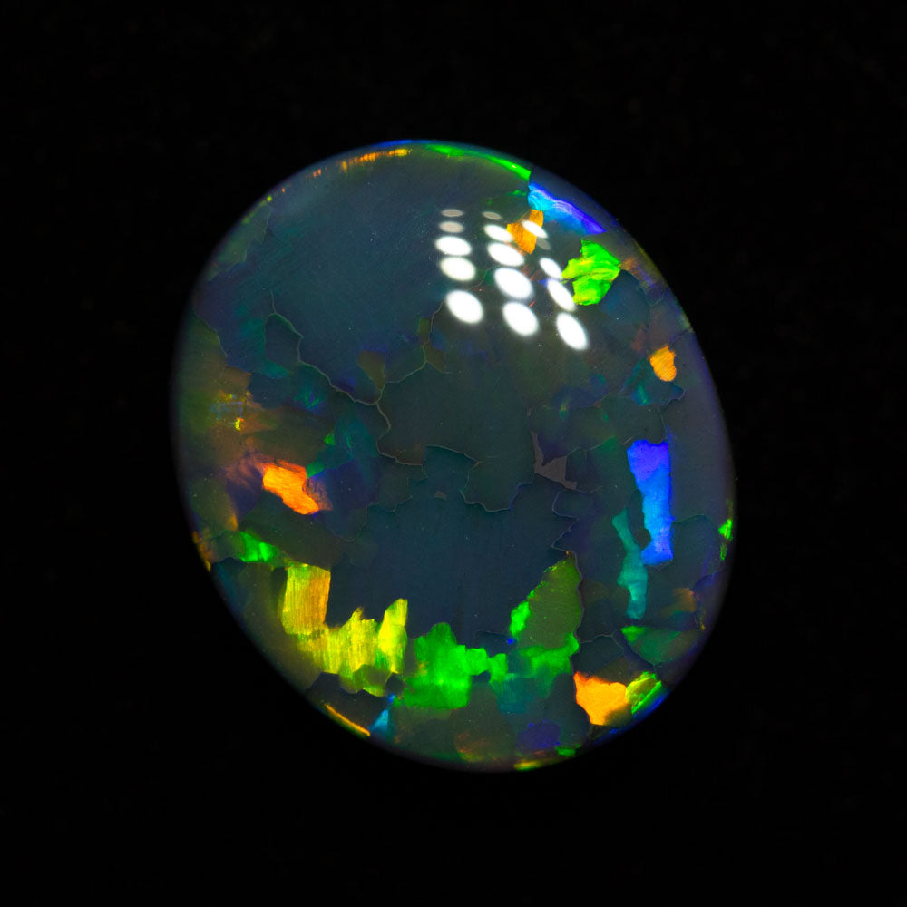 4.41 ct double sided gem black opal 12.2x10.4x5.7mm
