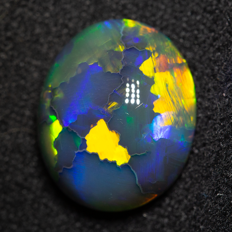 4.41 ct double sided gem black opal 12.2x10.4x5.7mm